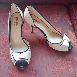 Coach and four brand new heels